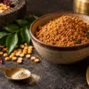 Small pinch of hing beside podi, roasted lentils and chillies