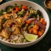 Podi protein bowl with millet, seared tofu, roasted vegetables and lime