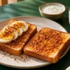 Buttered podi toast with sliced boiled egg, curd and coffee