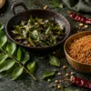Fresh curry leaves, gently roasted curry leaves and a bowl of podi
