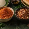 Tamil milagai podi and Karnataka chutney pudi in separate bowls