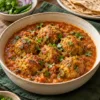 Lauki kofta curry served with roti