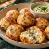Golden podi paniyaram with a soft cooked centre