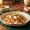 Firm tofu scramble with onion, tomato, coriander and podi seasoning.